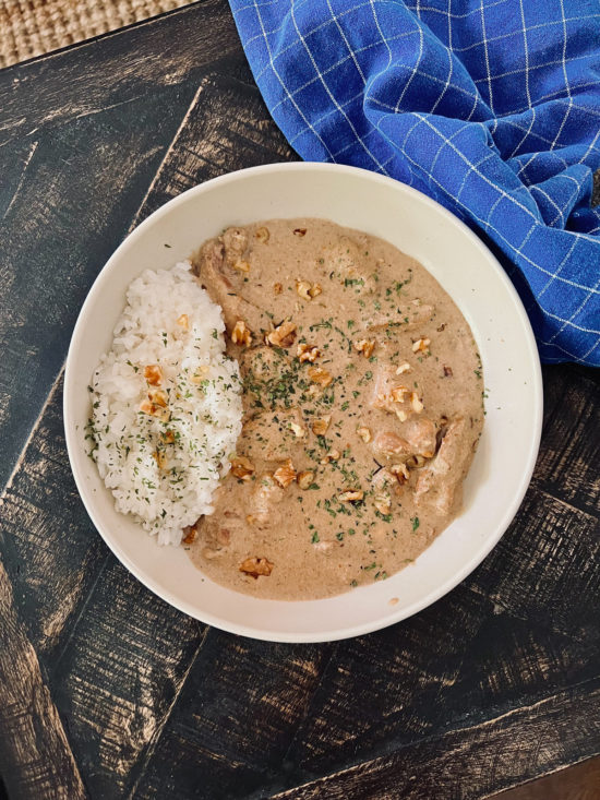 Chicken served in a deliciously creamy walnut sauce, overhead shot